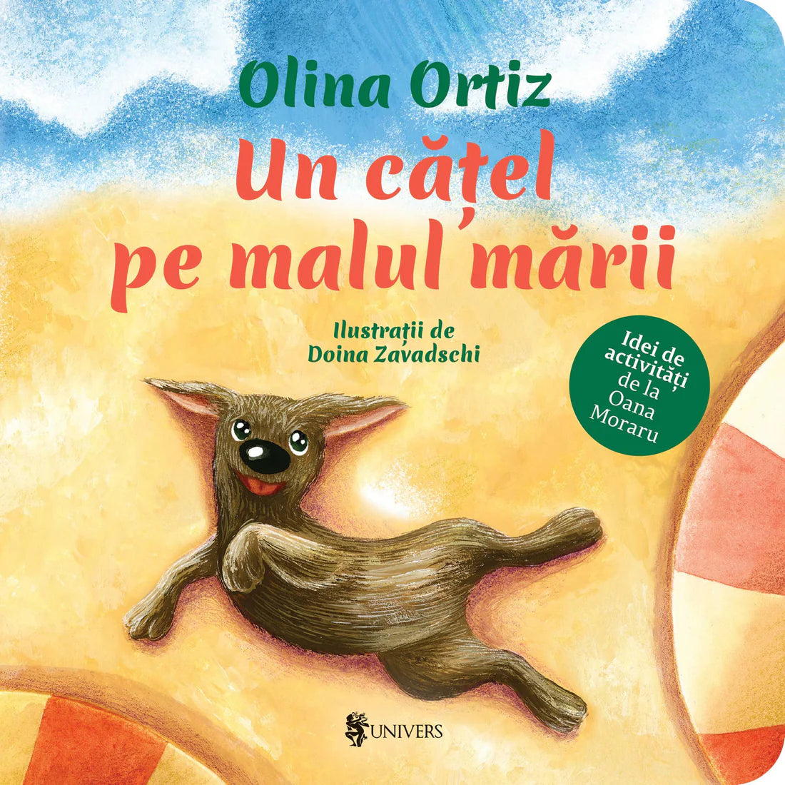 Un catel pe malul marii